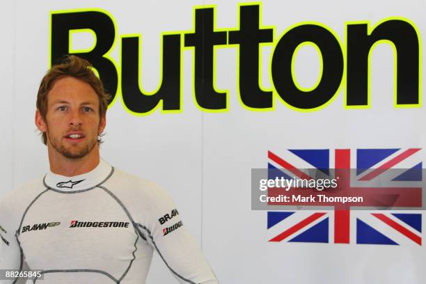 Jenson Button of Great Britain and Brawn GP is seen in his team garage during practice for the Turkish Formula One Grand Prix at Istanbul Park on...