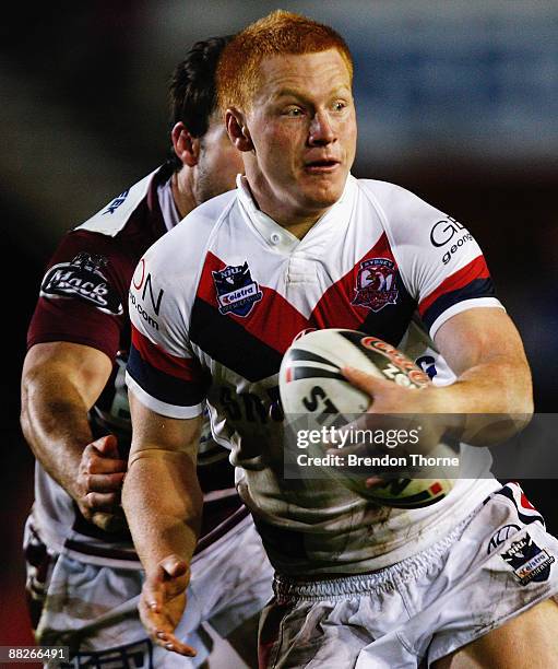 Ben Jones of the Roosters runs with the ball during the round 13 NRL match between the Manly Warringah Sea Eagles and the Sydney Roosters at...