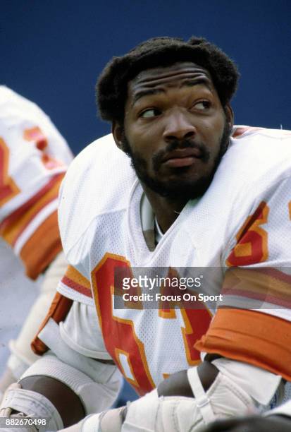 Lee Roy Selmon of the Tampa Bay Buccaneers looks on from the bench during an NFL football game circa 1980. Selmon played for the Buccaneers from...