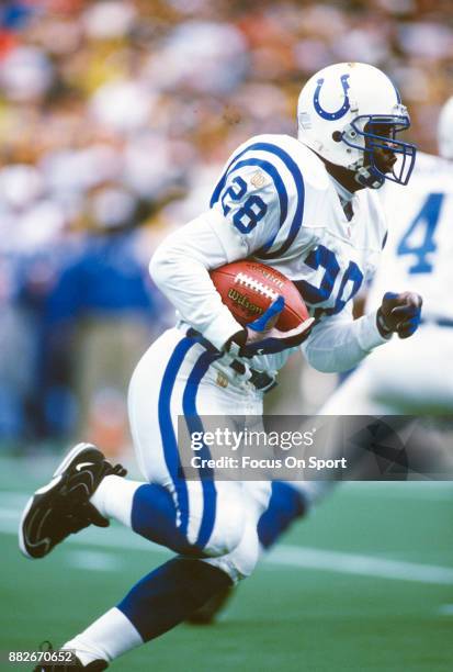 Marshall Faulk of the Indianapolis Colts carries the ball against the Pittsburgh Steelers during the AFC Wild Card game December 29, 1996 at Three...