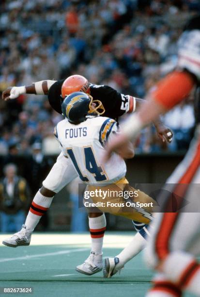 Reggie Williams of the Cincinnati Bengals sacks quarterback Dan Fouts of the San Diego Chargers during an NFL football game November 2, 1980 at...