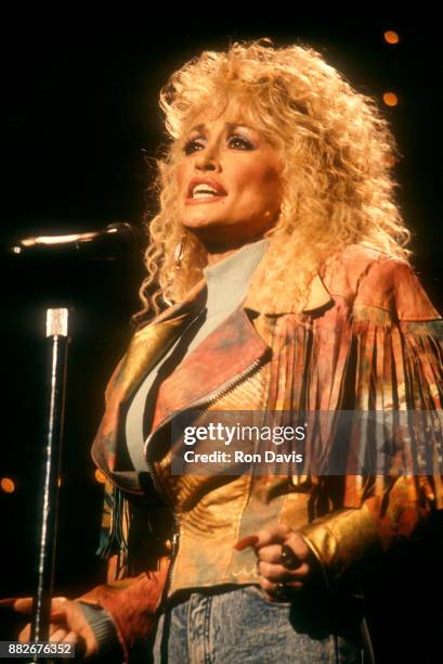 American singer and songwriter Dolly Parton rehearses for the Gospel Music Association Dove Awards circa 1989 in Nashville, Tennessee.