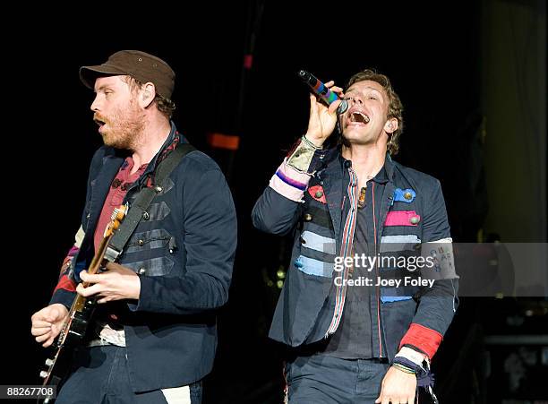 Jonny Buckland and Chris Martin of Coldplay perform at the Verizon Wireless Music Center on June 5, 2009 in Noblesville, Indiana.