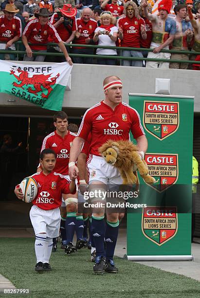 Paul O'Connell, the Lions captain, leads out the team before the match between the Cheetahs and the British and Irish Lions on their 2009 tour of...