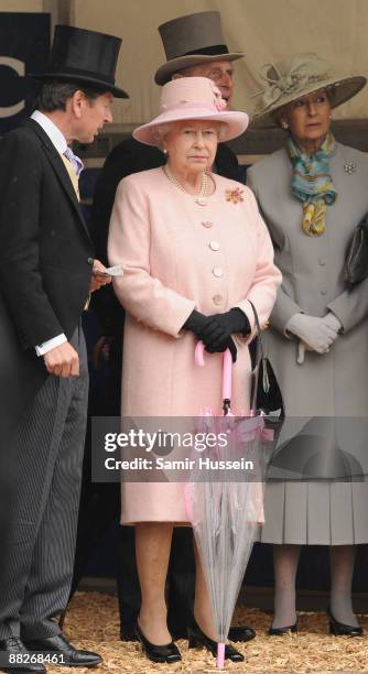 Queen Elizabeth II and Prince Philip, Duke of Edinburgh attend the Epsom Derby on June 6, 2009 in Epsom, England.