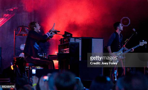 Chris Martin and Guy Berryman of Coldplay perform at the Verizon Wireless Music Center on June 5, 2009 in Noblesville, Indiana.