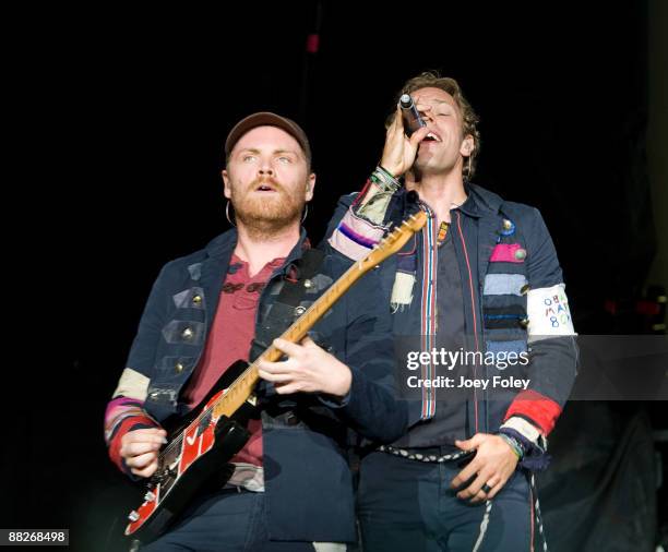 Jonny Buckland and Chris Martin of Coldplay perform at the Verizon Wireless Music Center on June 5, 2009 in Noblesville, Indiana.