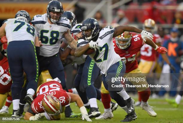 Eddie Lacy of the Seattle Seahawks carries the ball against the San Francisco 49ers during their NFL football game at Levi's Stadium on November 26,...