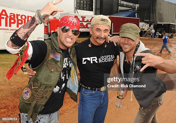 Country Musicians LoCash Cowboys are joined by Country singer/songwriter Aaron Tippin backstage at the 2009 BamaJam Music and Arts Festival on June...