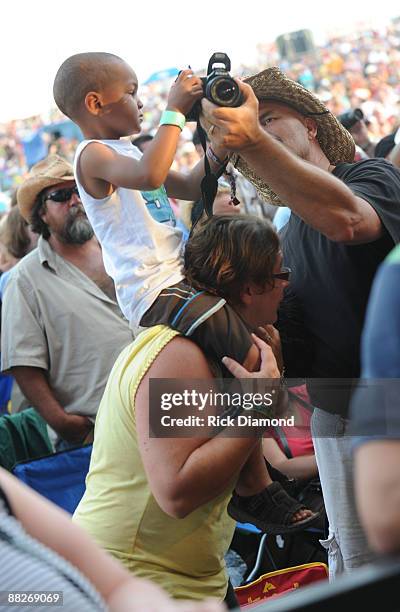 Young fan takes a photo at the 2009 BamaJam Music and Arts Festival on June 5, 2009 in Enterprise, Alabama.