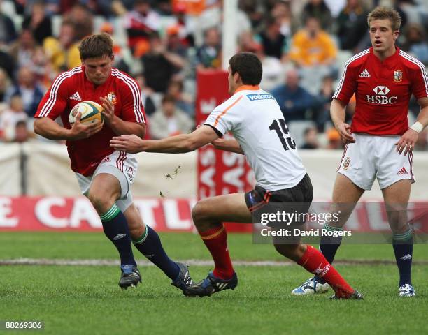 Ross Ford of the Lions takes on Hennie Daniller during the match between the Cheetahs and the British and Irish Lions on their 2009 tour of South...