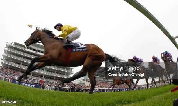 Sea The Stars ridden by Mick J. Kinane wins The Investec Derby at Epsom Racecourse on June 6, 2009 in Epsom, England.