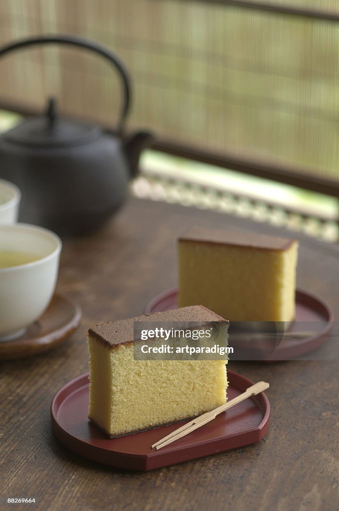 Japanese sponge cakes with green teas and teapot