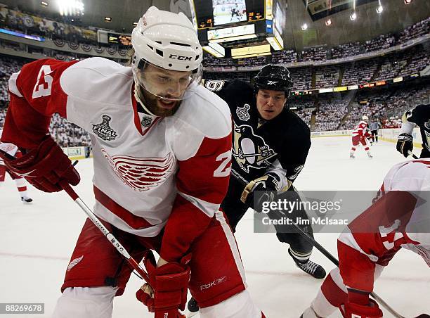 Brad Stuart of the Detroit Red Wings skates against Ruslan Fedotenko of the Pittsburgh Penguins during Game Four of the 2009 NHL Stanley Cup Finals...