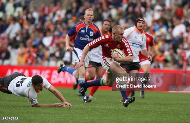 Keith Earls of the Lions races away to score the second try during the match between the Cheetahs and the British and Irish Lions on their 2009 tour...