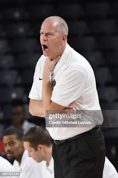 Head coach Tad Boyle of the Colorado Buffaloes reacts to call during the quarterfinals of the Paradise Jam college basketball tournament against the...