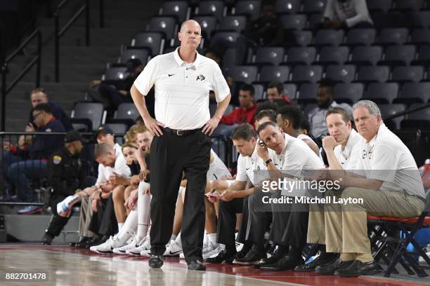 Head coach Tad Boyle of the Colorado Buffaloes looks on during the quarterfinals of the Paradise Jam college basketball tournament against the...
