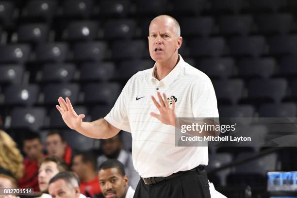 Head coach Tad Boyle of the Colorado Buffaloes looks on during the quarterfinals of the Paradise Jam college basketball tournament against the...