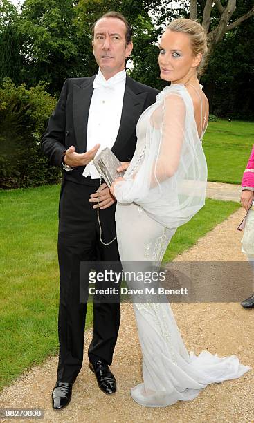 Robert Hanson and Masha Markova arrive at the Raisa Gorbachev Foundation Annual Fundraising Gala Dinner, at the Stud House, Hampton Court Palace on...