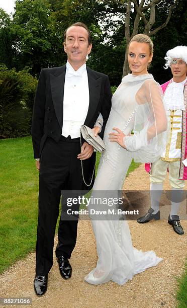 Robert Hanson and Masha Markova arrive at the Raisa Gorbachev Foundation Annual Fundraising Gala Dinner, at the Stud House, Hampton Court Palace on...