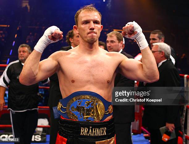 Juergen Braehmer of Germany celebrates his victory against Antonio Brancalion of Italy after the first round of the European Championship & WBC Light...