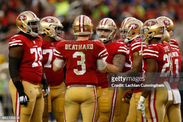 Beathard of the San Francisco 49ers calls a play in the huddle against the Seattle Seahawks at Levi's Stadium on November 26, 2017 in Santa Clara,...
