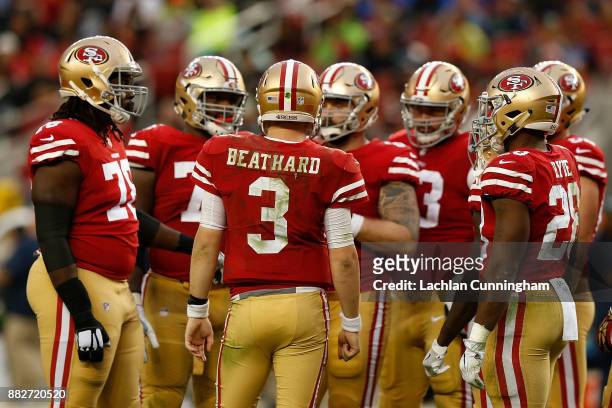 Beathard of the San Francisco 49ers calls a play in the huddle against the Seattle Seahawks at Levi's Stadium on November 26, 2017 in Santa Clara,...