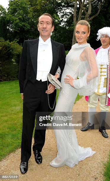 Robert Hanson and Masha Markova arrive at the Raisa Gorbachev Foundation Annual Fundraising Gala Dinner, at the Stud House, Hampton Court Palace on...