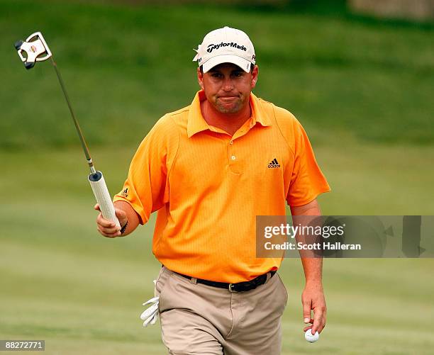 Matt Bettencourt smiles after making birdie on the 15th hole during the third round of the Memorial Tournament at the Muirfield Village Golf Club on...