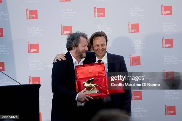 Tobias Rehberger receives the Golden Lion the Best Artist of the exhibition Fare Mondi with Daniel Birnbaum director of the Venice Biennale during...