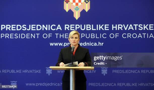 Croatian President Kolinda Grabar-Kitarovic addresses a press conference in Zagreb on November 30 a day after the suicide of former military...