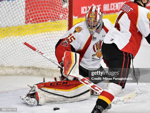 Goaltender Antoine Samuel of the Baie-Comeau Drakkar makes a pad save against the Blainville-Boisbriand Armada during the QMJHL game at Centre...