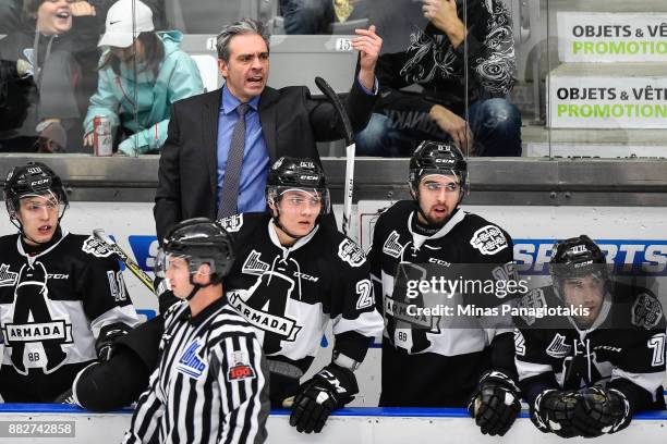 Head coach of the Blainville-Boisbriand Armada Joel Bouchard calls out instructions to his players against the Baie-Comeau Drakkar during the QMJHL...