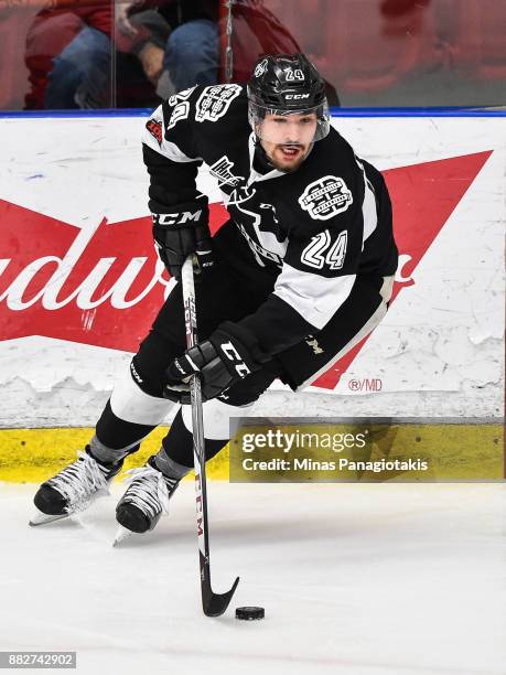 Joel Teasdale of the Blainville-Boisbriand Armada skates the puck against the Baie-Comeau Drakkar during the QMJHL game at Centre d'Excellence Sports...