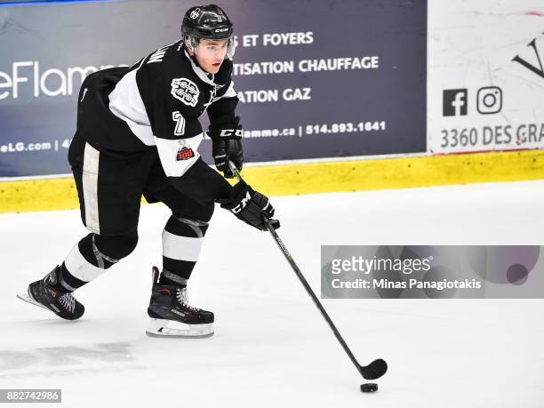 Alexandre Alain of the Blainville-Boisbriand Armada skates the puck against the Baie-Comeau Drakkar during the QMJHL game at Centre d'Excellence...