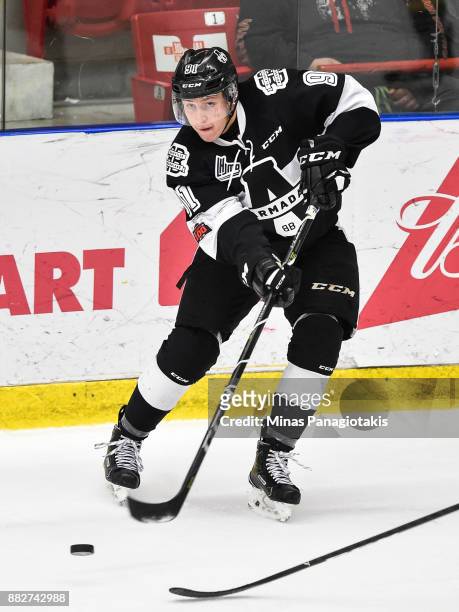 Shaun Miller of the Blainville-Boisbriand Armada plays the puck against the Baie-Comeau Drakkar during the QMJHL game at Centre d'Excellence Sports...