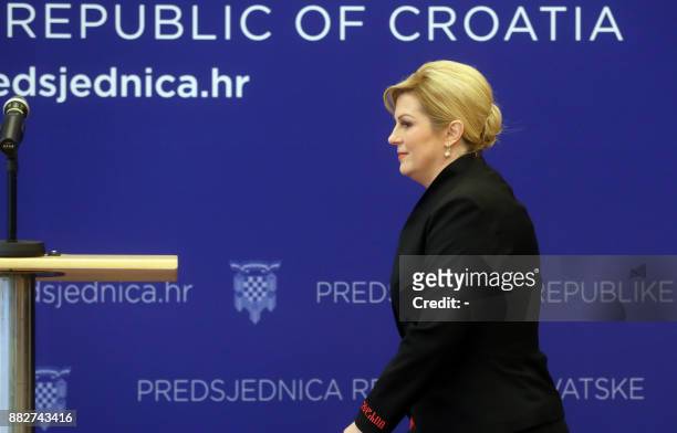Croatian President Kolinda Grabar-Kitarovic arrives to address a press conference in Zagreb on November 30 a day after the suicide of former military...