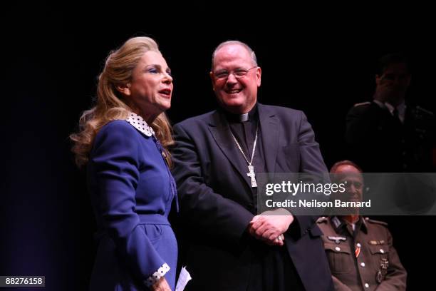 Archbishop Timothy Dolan and actress Tovah Feldshuh appear on stage for the curtain call of "Irena's Vow" at Walter Kerr Theatre on June 6, 2009 in...