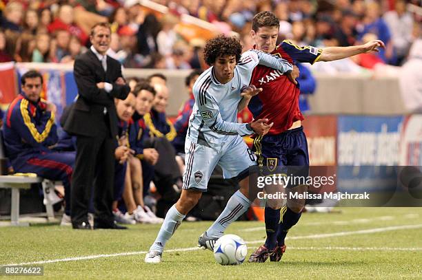 Will Johnson of Real Salt Lake goes after the ball against Mehdi Ballouchy of Colorado Rapids at Rio Tinto Stadium on June 06, 2009 in Sandy, Utah.