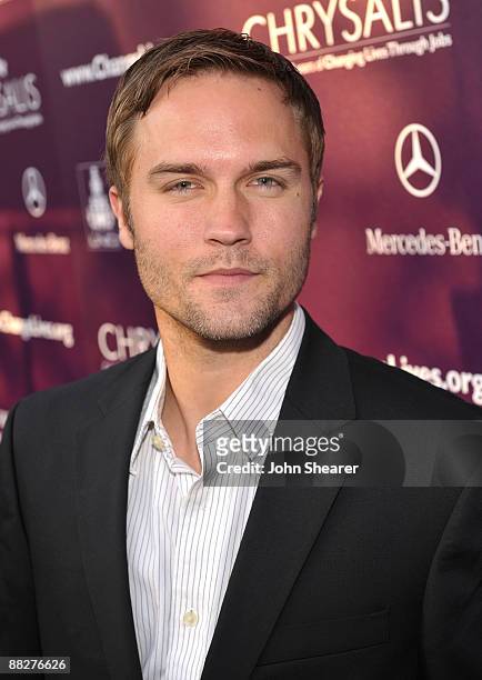 Actor Scott Porter arrives at the 8th annual Chrysalis Butterfly Ball held at a private residence on June 6, 2009 in Brentwood, California.