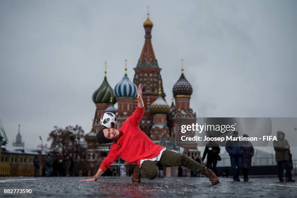 Professional football freestyler, circus artist and 2018 FIFA World Cup Russia Draw performer Vladislav Kostuchenko poses with the official adidas...