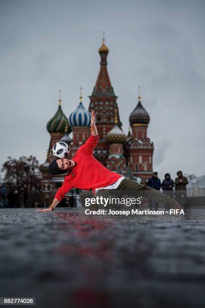 Professional football freestyler, circus artist and 2018 FIFA World Cup Russia Draw performer Vladislav Kostuchenko poses with the official adidas...