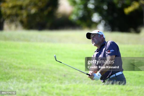 Hennie Otto of South Africa plays his third shot on the 2nd during day one of the AfrAsia Bank Mauritius Open at Heritage Golf Club on November 30,...