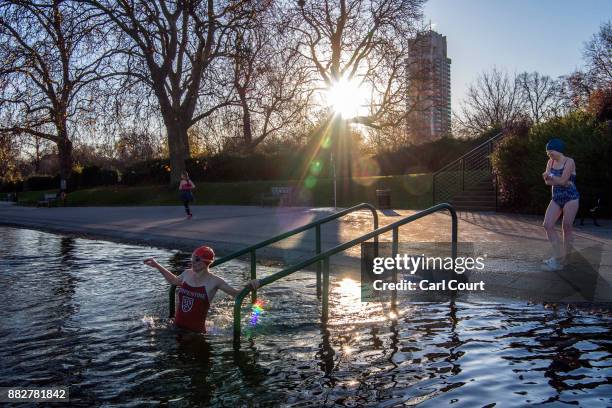 Members of the Serpentine Swimming Club enjoy an early morning swim in Serpentine Lake in Hyde Park on November 30, 2017 in London, England. Today...