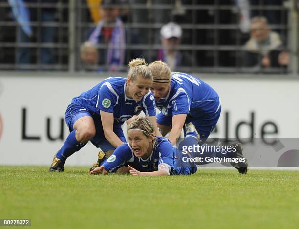 Jennifer Zietz of Potsdam celebrate the first goal with Anja Mittag and Tabea Kemme during the Women Bundesliga match between FFC Turbine Potsdam and...