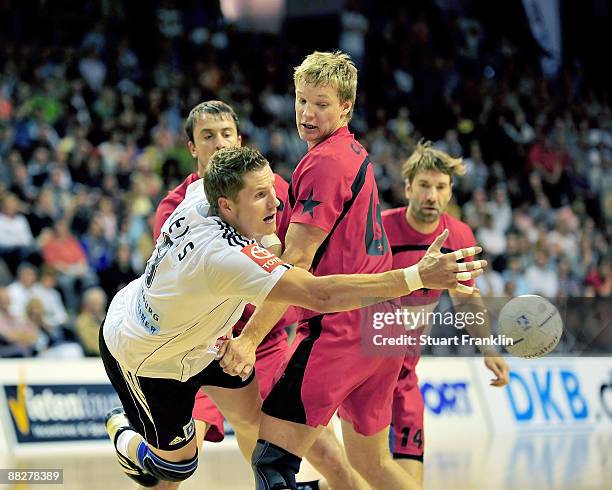 Sebastian Preiss of Germany is challenged by Momir Ilic of the Allstars during a friendly game between Germany and the Handball Bundesliga Allstars...