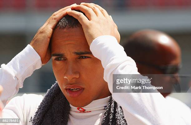 Lewis Hamilton of Great Britain and McLaren Mercedes tries to keep cool on the grid before the Turkish Formula One Grand Prix at Istanbul Park on...