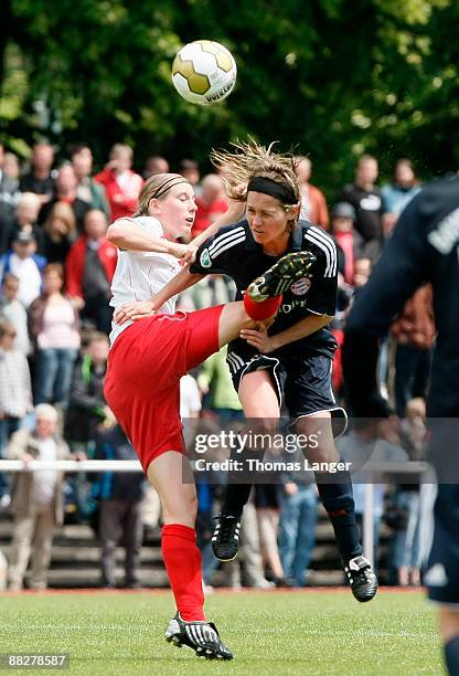 Annika Eberhardt of Crailsheim and Tanja Woerle of Munich battle for the ball during the Women's Bundesliga match between FC Bayern Muenchen and TSV...