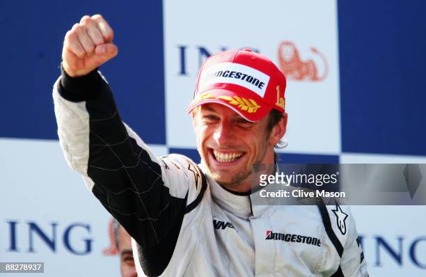 Jenson Button of Great Britain and Brawn GP celebrates on the podium after winning the Turkish Formula One Grand Prix at Istanbul Park on June 7 in...
