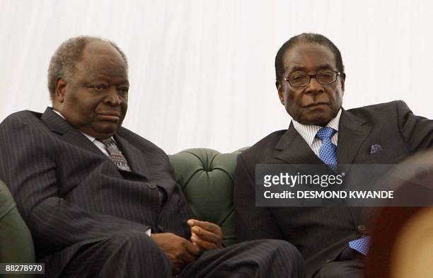 Zimbabwe's President Robert Mugabe is pictured with Kenya's President Mwai Kibaki at the two-day African trade summit Common Market for Eastern and...